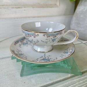 IMPERIAL SEVILLE CHINA CUP & SAUCER. WHITE WITH BLUE FLORAL DESIGN & GOLD TRIM.